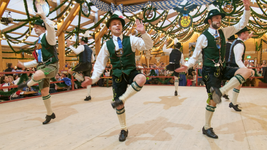 photo of traditional Bavarian dancing group at the Oktoberfest in Munich