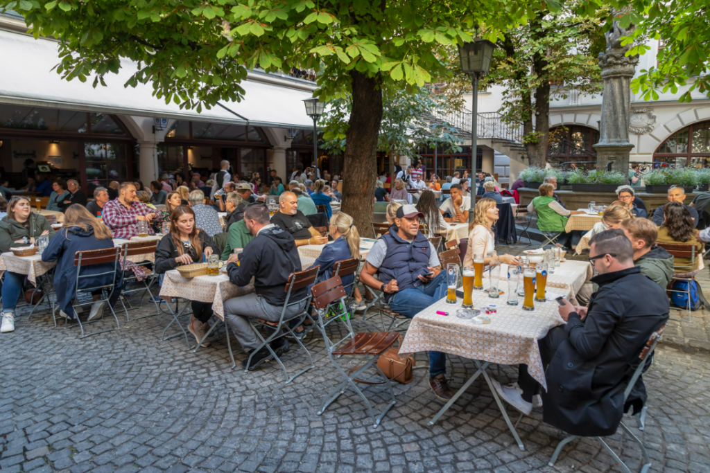 photo of people in the Hofbräuhaus beer garden in Munich, Germany