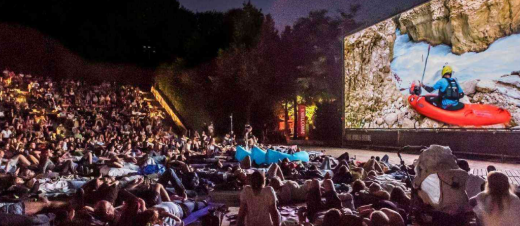 photo of people enjoying a film screening at an outdoor cinema in Munich